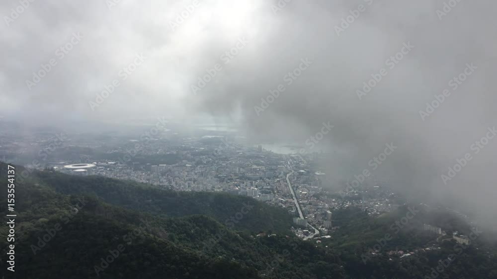 Cloudy day over Rio de Janeiro seen from mountain top.
