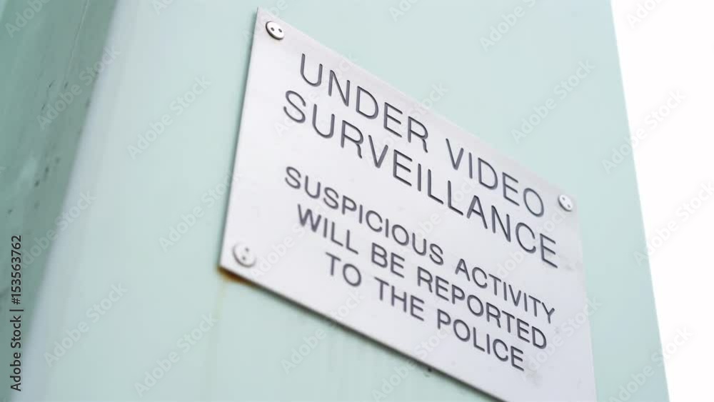 Under Video Surveillance sign warning people that they are being recorded.
Under Video Surveillance sign warning people that they are being recorded.