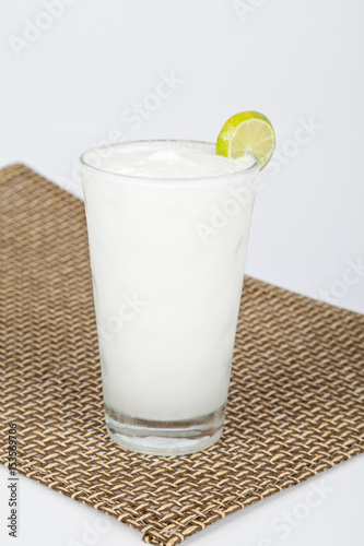 Coconut lemonade on a neutral background