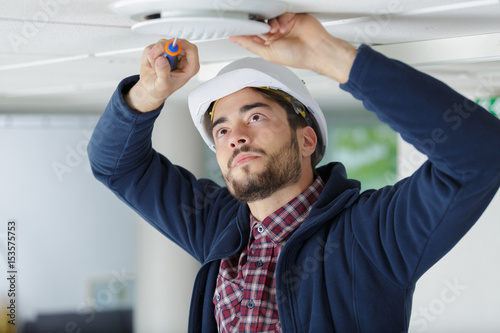 Contractor fitting ceiling vent