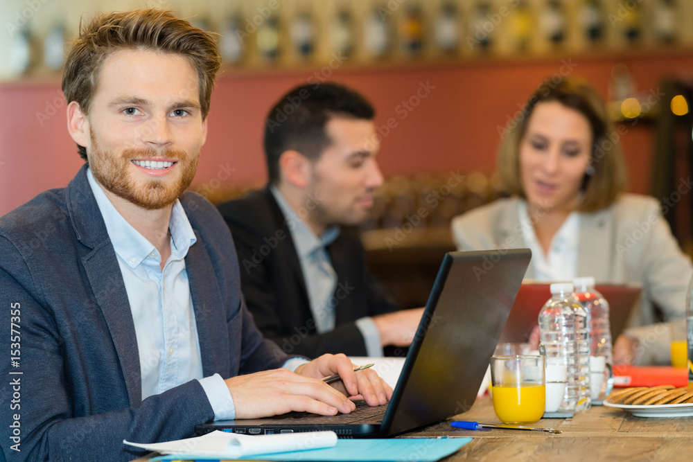 portrait of man in cafn© using laptop portrait of man in cafn© using laptop