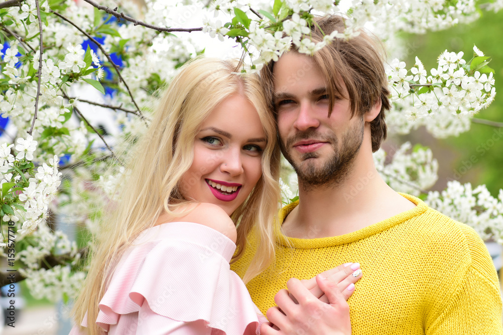 happy couple in love in spring cherry flowers happy couple in love in spring cherry flowers