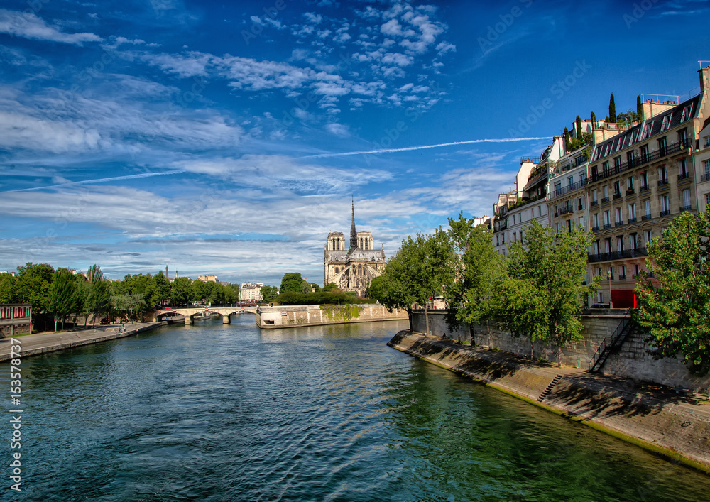 Fototapeta premium Backview of the Cathedral Notre Dame and river Seine at the Ile de la Cité at Paris