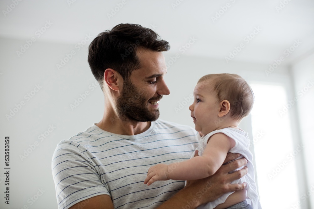 Father holding his baby girl Father holding his baby girl