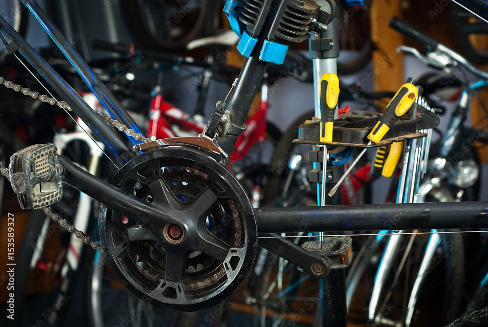 Fototapeta premium Master bike repairs in the workshop 4