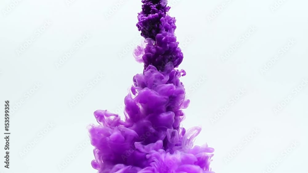 Purple ink drop in water on a white background.