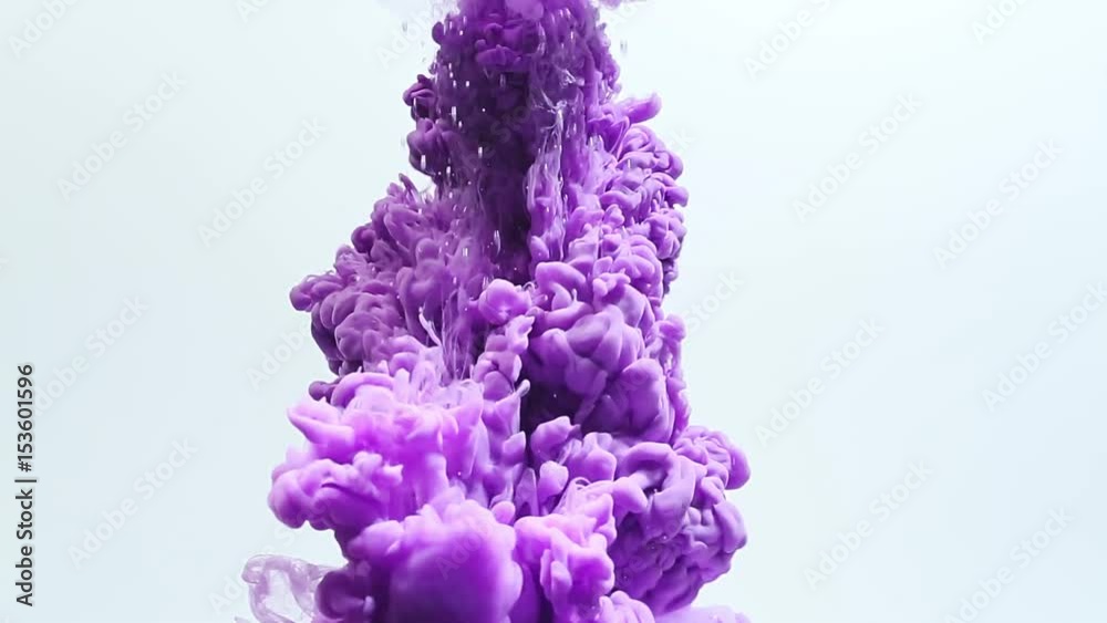 Abstract dynamic flow of bright purple ink in clear water on white background. Abstract dynamic flow of bright purple ink in clear water on white background.