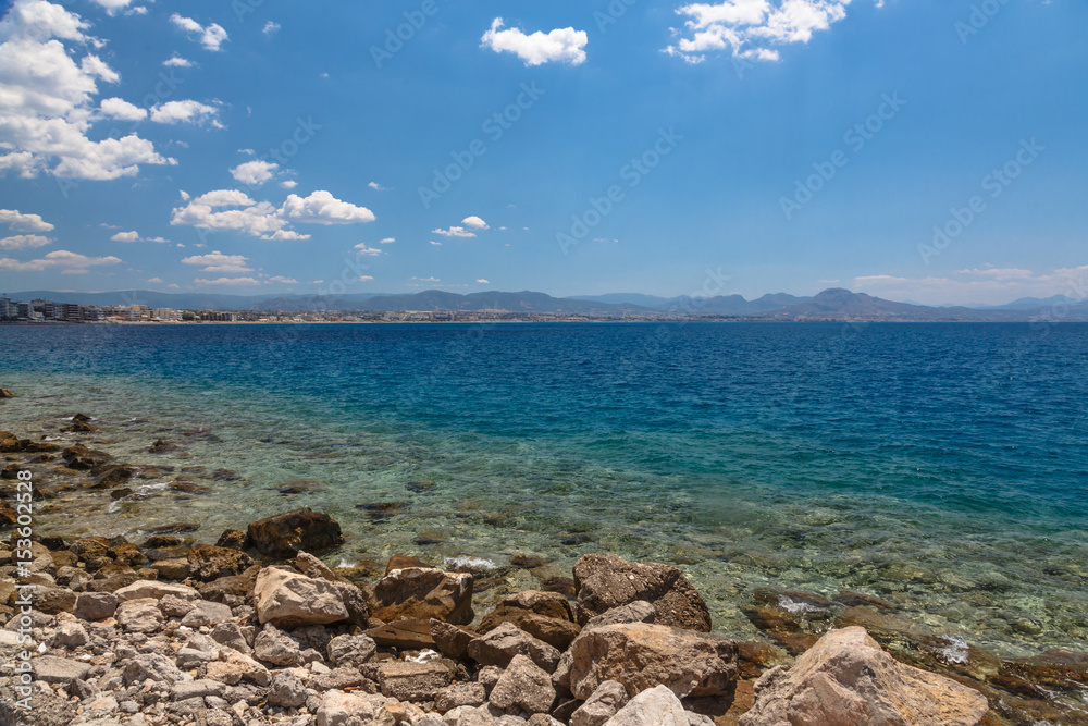 Loutraki City view from Aegean sea in Greece.