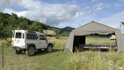 4x4 car in front of a camp © stephane