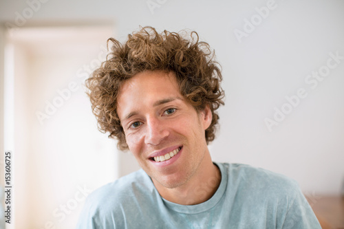 Portrait of young man smiling happily