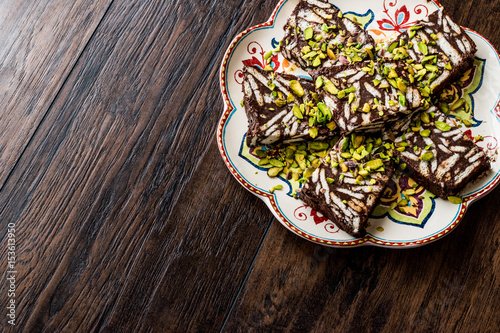 Mosaic Chocolate and Biscuit Cake with pistachio.