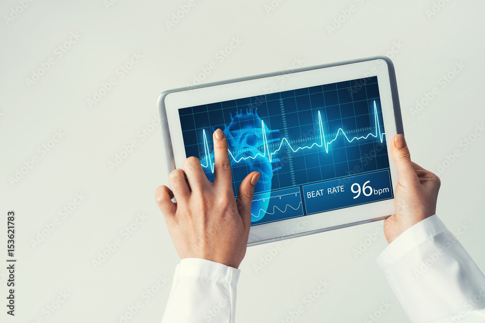Close of female doctor hands working with tablet pc computer Close of female doctor hands working with tablet pc computer