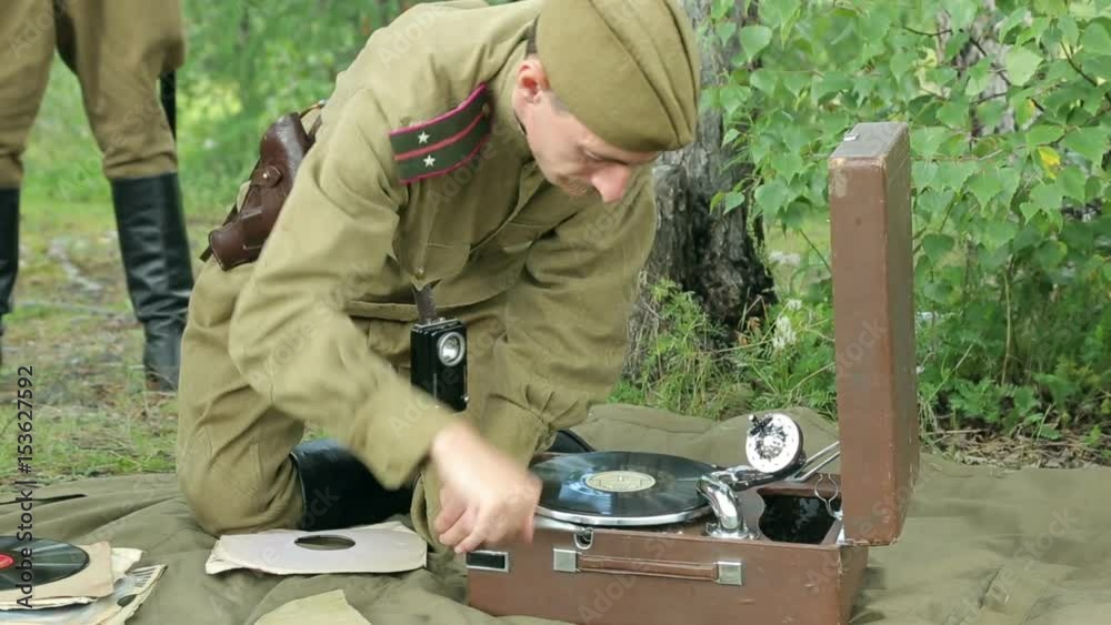 The army of the USSR. Soviet army soldiers are resting. Soldiers listen