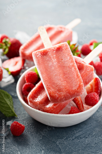 Strawberry and raspberry popsicles