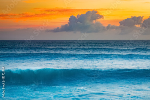 Big wave of Indian ocean at sunset