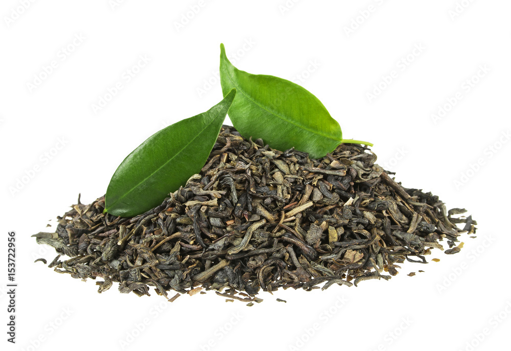 Heap of dry tea with green tea leaves isolated on a white background