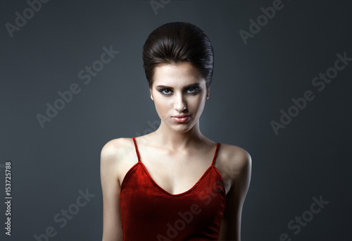 Beautiful woman with evening make-up and updo