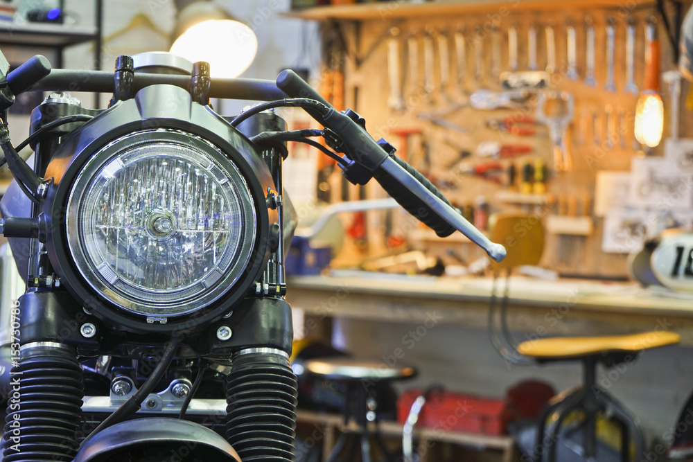 Fototapeta premium New motorbike in the garage.