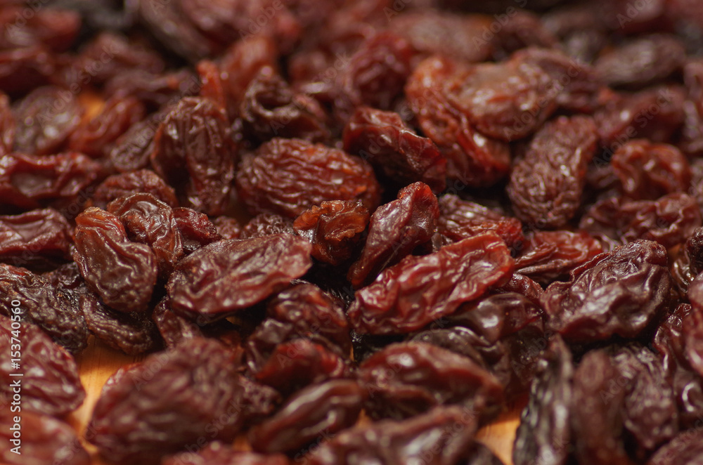 Delicious raisins as background Grape Raisin texture Delicious raisins as background Grape Raisin texture