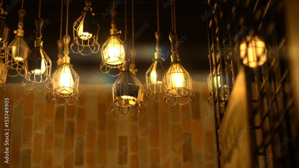 Retro Light Bulb Lighting Series. Lights with brick wall. 
Traditional classic ceiling light bulb lighting for video opening or closing background. 
