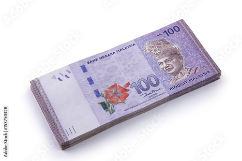 Stack of 100 Ringgit Malaysia on white photo