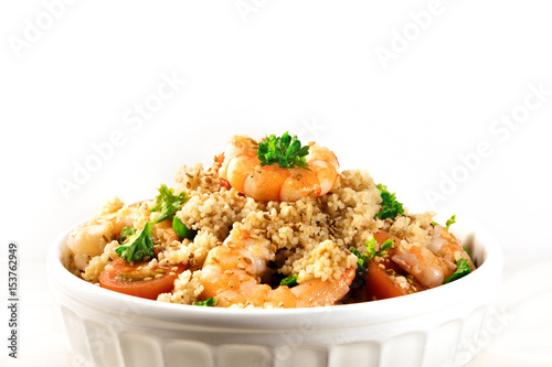 Closeup of shrimp coucous on white with copyspace