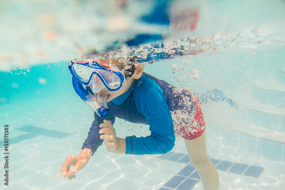 Underwater Young Boy Fun in the Swimming Pool with snorkel. Summer ...