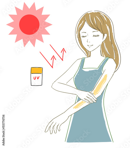 日焼止めをぬる女性