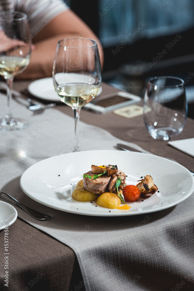 delicious roulade of rabbit meat in a restaurant. small portion delicious roulade of rabbit meat in a restaurant. small portion