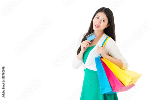 young girl using credit card shopping online
