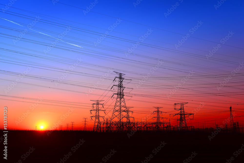 High piezoelectric towers, in the setting sun