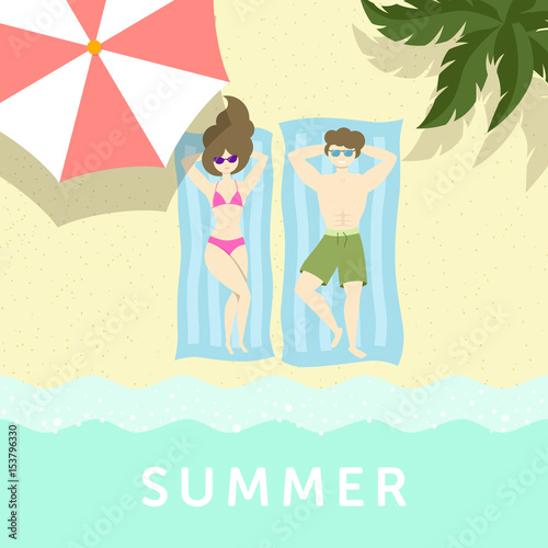 Couple having sunbathe on the sea shore under palm tree and umbrella.