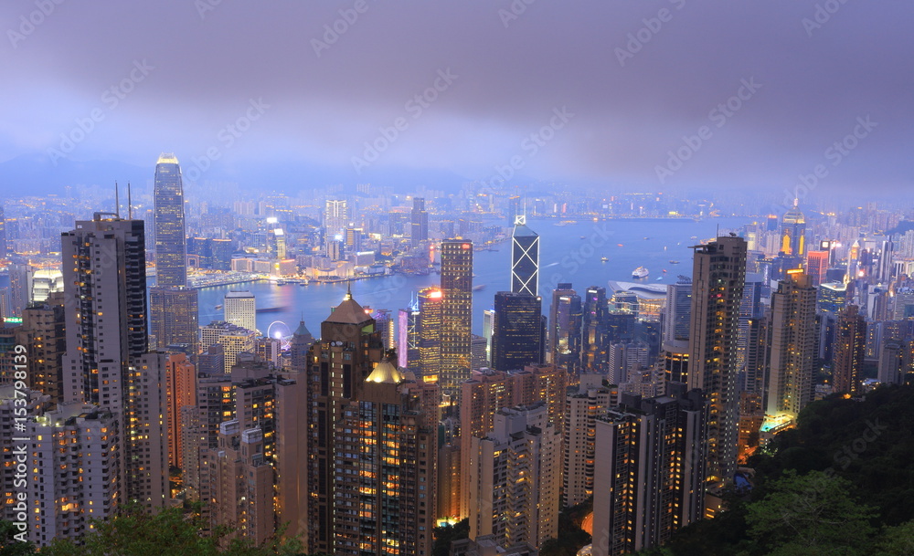 Sunset over Victoria Harbor as viewed atop Victoria Peak, Hong Kong