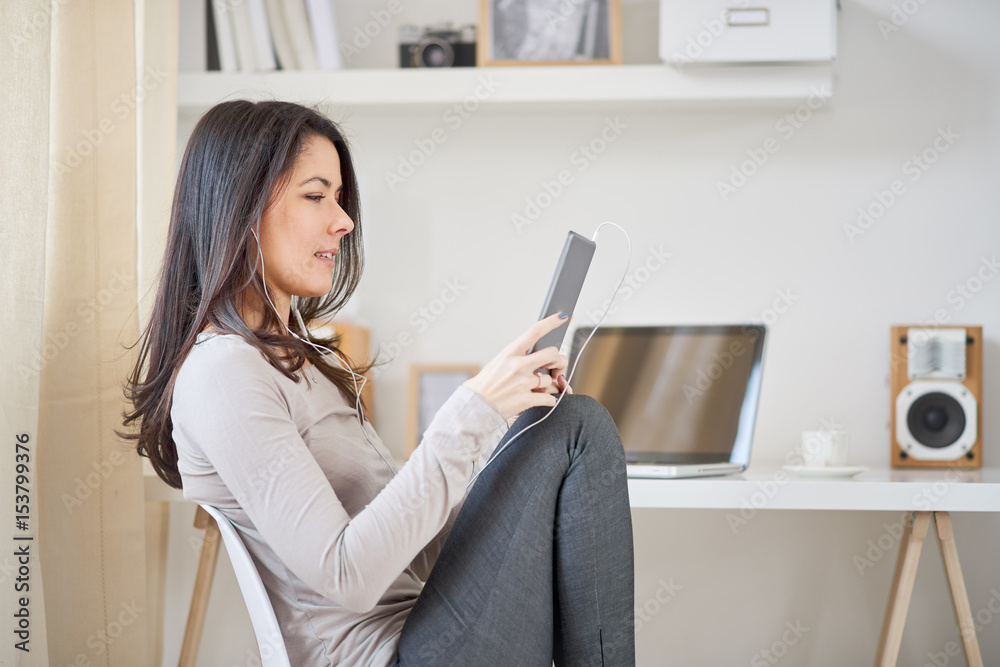 Caucasian girl in modern home office Caucasian girl in modern home office