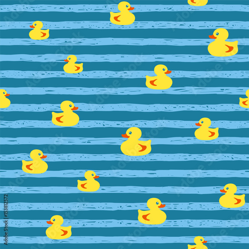 Seamless vector pattern - bath ducks on blue stripes