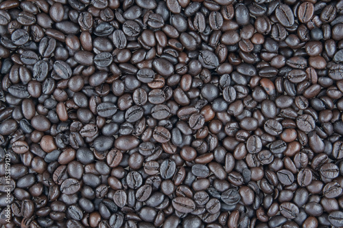 Black roasted coffee beans use as background