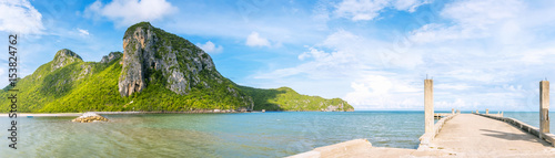 Panorama, scenery with islands and fish outlets stretching out to sea with blue skies, beaches, turquoise sea; places at Khlong Wa, Prachuap Khiri Khan, Thailand