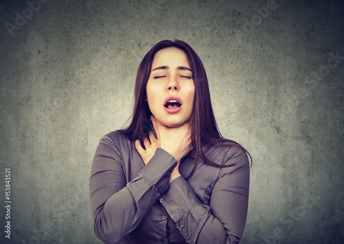 Cuadro en lienzo Woman having asthma attack or choking can't breath suffering from respiration pr