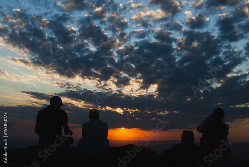 People silhouettes at sunset in Brazil