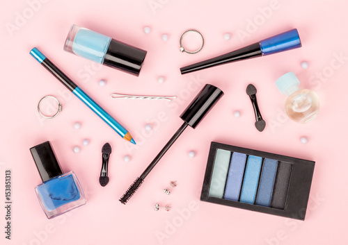 set of professional decorative cosmetics, makeup tools and accessory on pink background. beauty, fashion and shopping concept. flat lay composition, top view