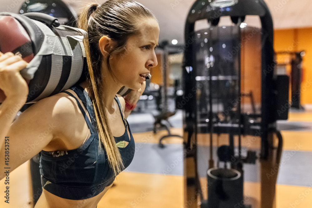Woman working out in gym Woman working out in gym