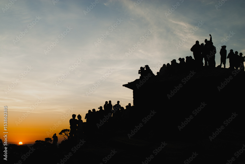 People silhouettes at sunrise in Brazil