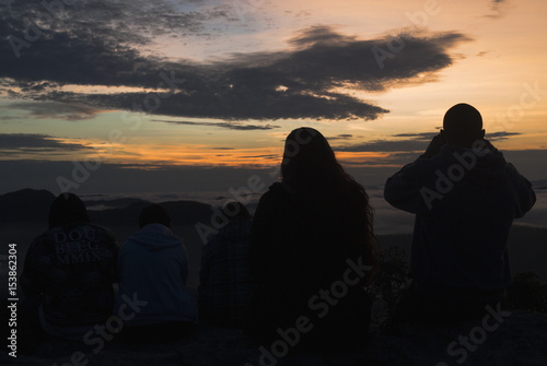 People silhouettes at sunrise in Brazil