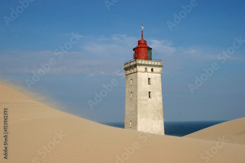 Lighthouse in the dunes after sand drift © Arne