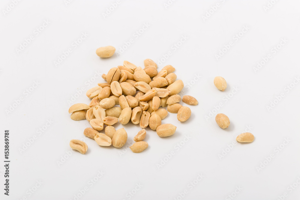Fried salted peanuts on white background. snack. Fried salted peanuts on white background. snack.