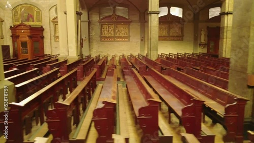 Aerial slider shot along the Catholic Church Benches in 4K photo