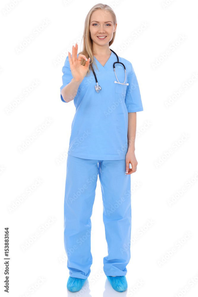 Smiling young nurse showing Ok sign isolated over white background. Advertising in medicine and health care Smiling young nurse showing Ok sign isolated over white background. Advertising in medicine and health care