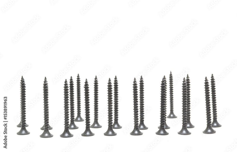 A pile of black screws. Isolated on white. A pile of black screws. Isolated on white.