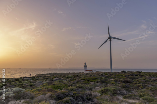 Polente Light House and wind mill at dusk