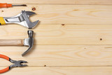 industrial tools on light wooden background with copy space. top view. tools texture. tools background